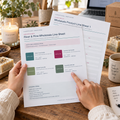 Maker reviewing the H. Doucette Studio Wholesale Line Sheet Kit with candle and soap products