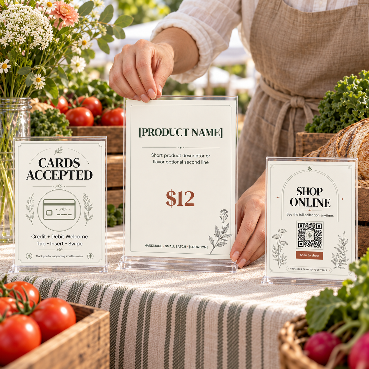Vendor setting up editable price, payment, and shop online signs from the Farmers Market Business Kit