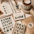 Succulent clipart used on plant care cards, candle packaging, stickers, stationery, and a branded notebook